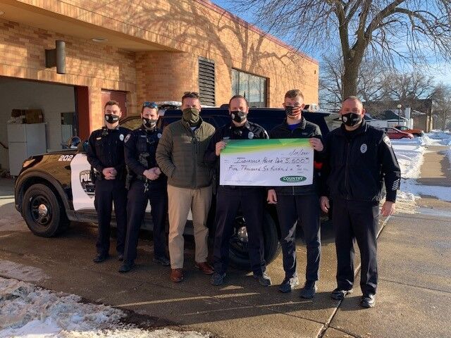Keller supports Indianola police with donation